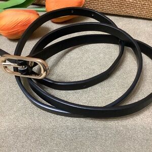 Slim Black Leather with oval Gold tone buckle size 40” L x 05” W